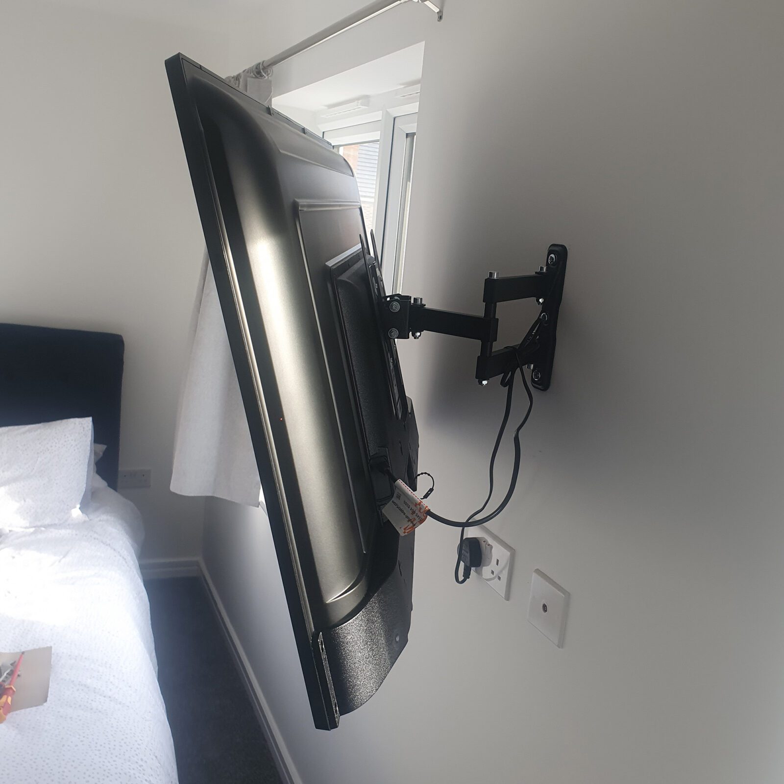 how to hang a tv on a wall