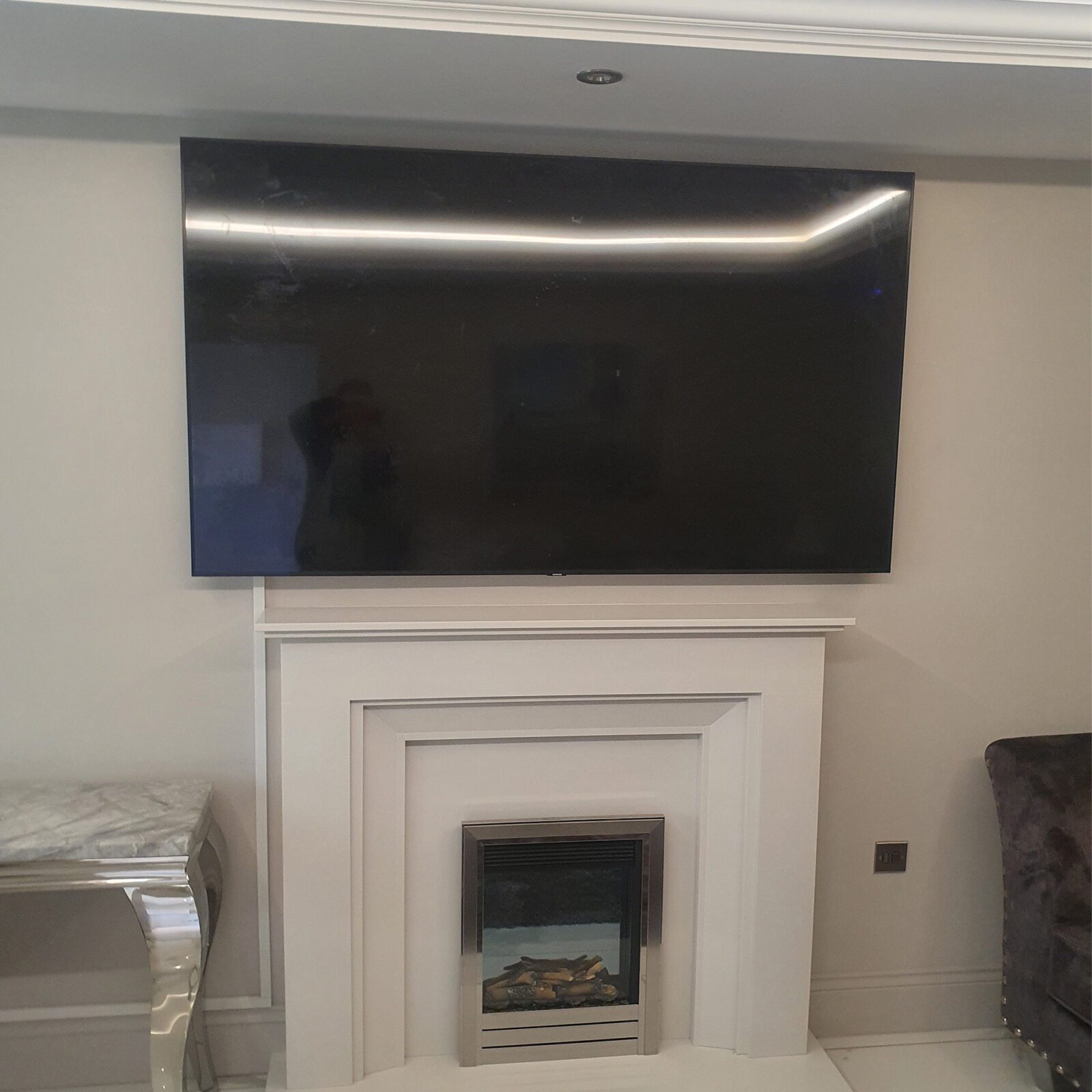 how to hang up a tv on the wall